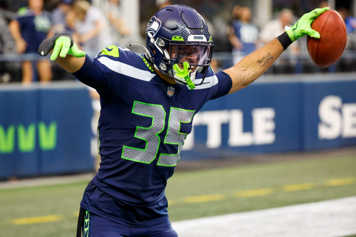 Seattle Seahawks safety Joey Blount (35) celebrates after recovering an on-side kick against the Chicago Bears during the fourth quarter at Lumen Field.